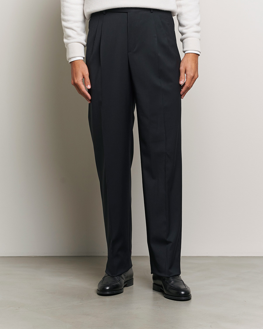 Herren |  | Brioni | Pleated Wool Trousers Navy