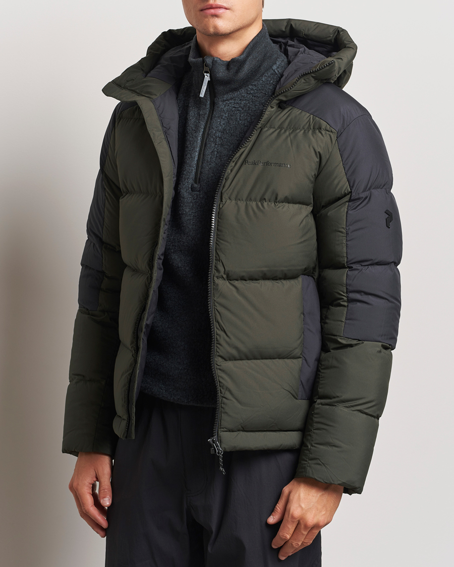 Herren |  | Peak Performance | Down Puffer Hood Jacket Olive Extreme